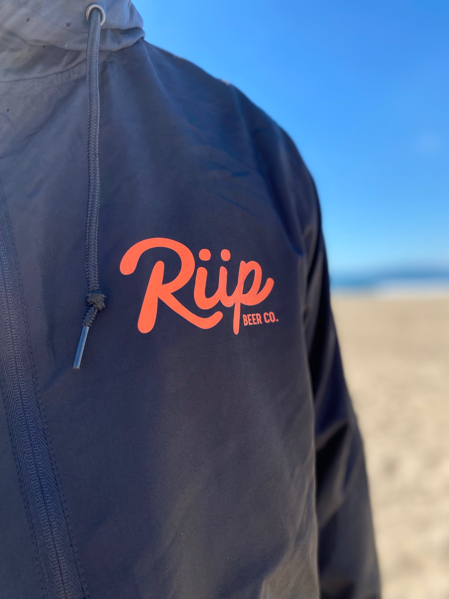Windbreaker | Riip Cursive | Black/ Orange